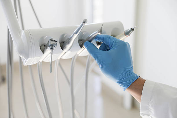 Professional Invisalign Clear Aligners technician working in Fairmount, NY